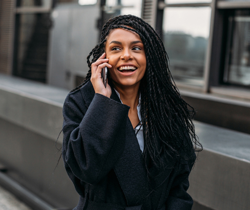 happy young woman on cell phone