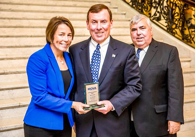 Maura Healey, Stephen P. Costello, and Michael Morrissey at the Massachusetts State House with award